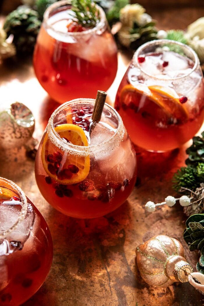 Sparkling Christmas Party Punch | halfbakedharvest.com #punch #christmasdrinks #cocktails side angled close up photo of Sparkling Christmas Party Punch