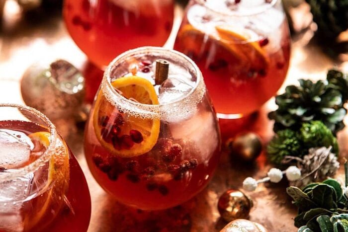 Sparkling Christmas Party Punch | halfbakedharvest.com #punch #christmasdrinks #cocktails horizontal photo of Sparkling Christmas Party Punch