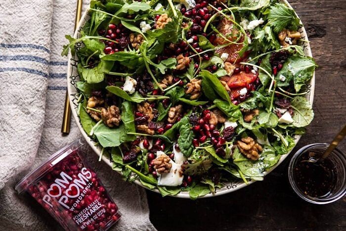 Winter Pomegranate Salad with Maple Candied Walnuts | halfbakedharvest.com #wontersalad #healthy horizontal photo of Winter Pomegranate Salad with Maple Candied Walnuts