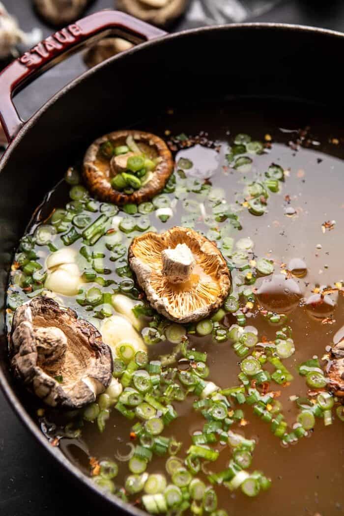 30 Minute Creamy Sesame Miso Ramen with Crispy Mushrooms | halfbakedharvest.com prep photo of soup in pot