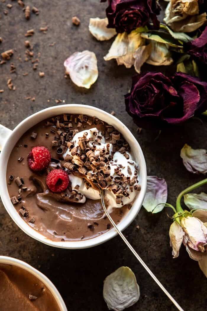overhead photo of 4 Ingredient Chocolate Mousse with spoon in mousse bowl 