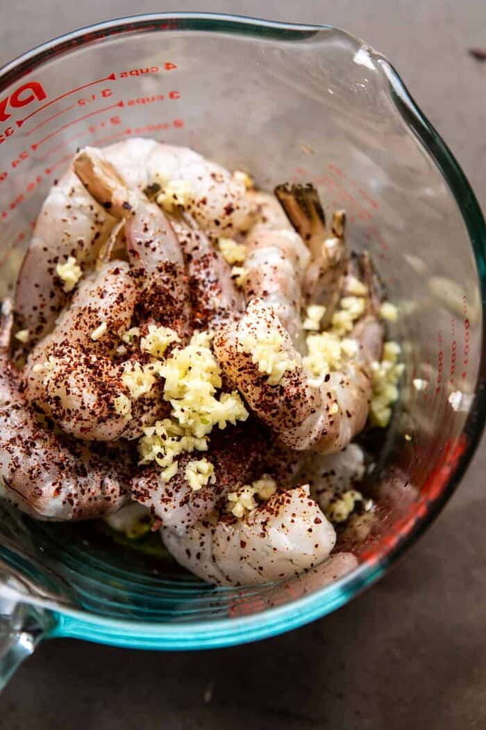 overhead photo of raw shrimp in a bowl 