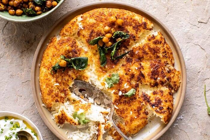 overhead horizontal photo of Crispy Persian Rice (Tahdig) with Spiced Golden Chickpeas