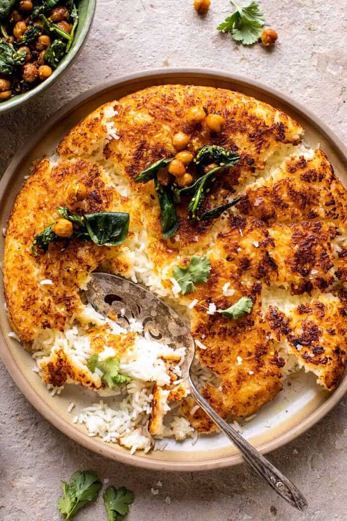 overhead close up photo of Crispy Persian Rice (Tahdig) with Spiced Golden Chickpeas