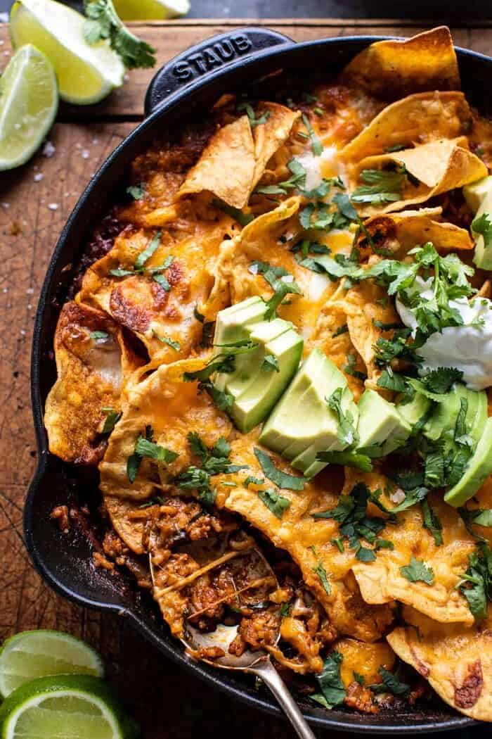 One Skillet Saucy Chicken Tortilla Enchilada Rice Bake | halfbakedharvest.com