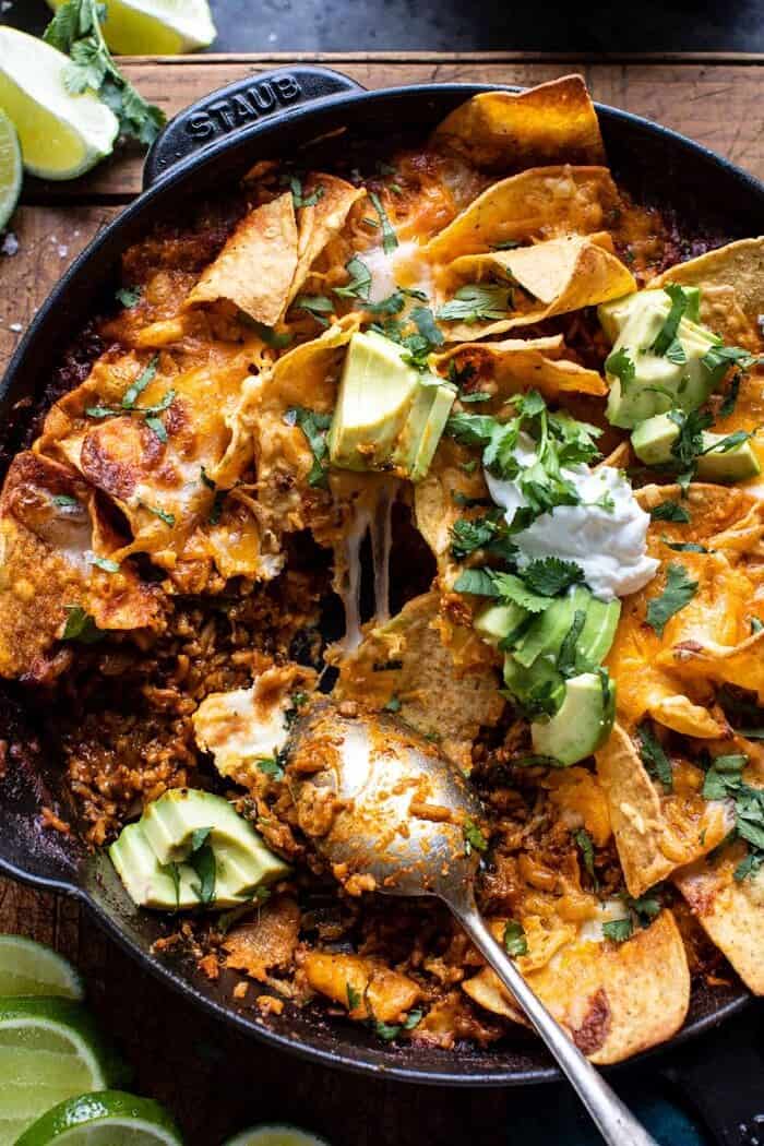 One Skillet Saucy Chicken Tortilla Enchilada Rice Bake | halfbakedharvest.com One Skillet Saucy Chicken Tortilla Enchilada Rice Bake | halfbakedharvest.com