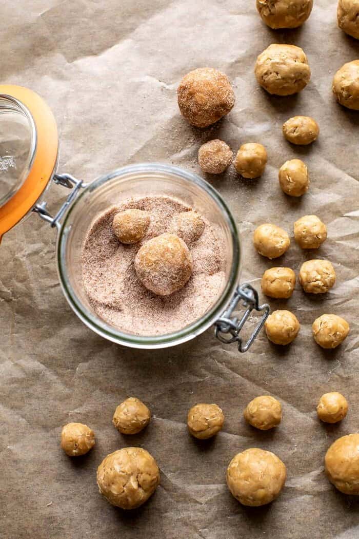 prep photo of rolling the dough balls in cinnamon sugar