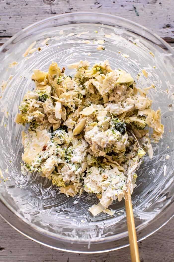 Artichoke and Broccoli Pesto Brie Panini with Thyme Honey | halfbakedharvest.com overhead prep photo of Artichoke and Broccoli filliing