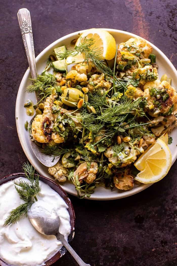 Lebanese Chicken with Charred Lemon Cauliflower | halfbakedharvest.com overhead photo of Charred Lemon Cauliflower and garlic yogurt