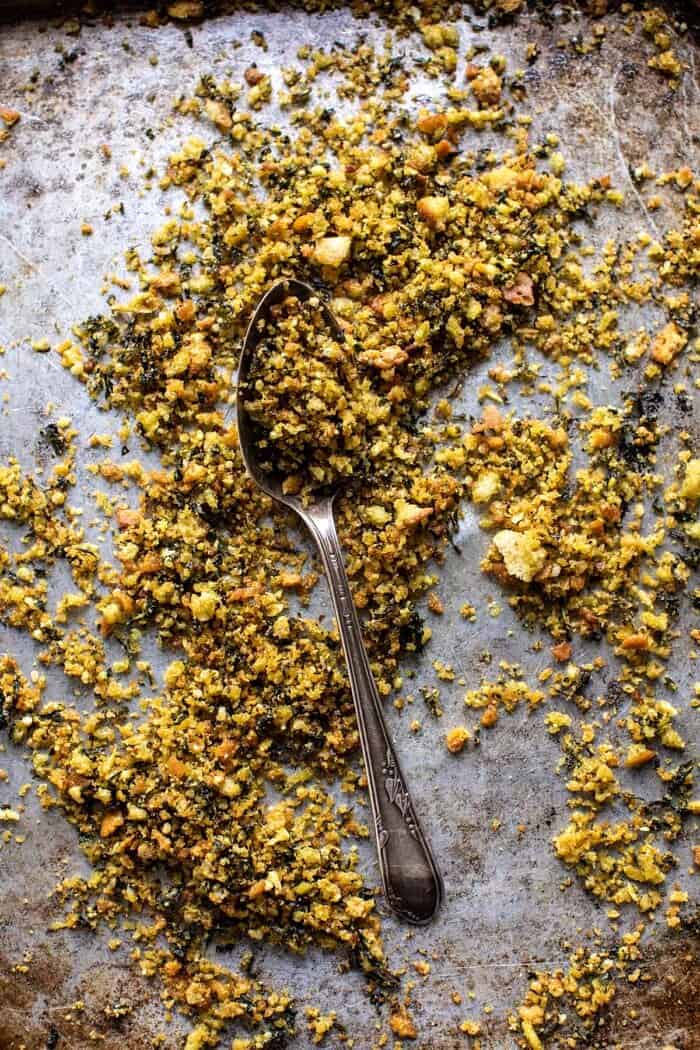 Lemon Butter Cheese Ravioli with Garlic Basil Breadcrumbs | halfbakedharvest.com prep photo of Garlic Basil Breadcrumbs on baking sheet