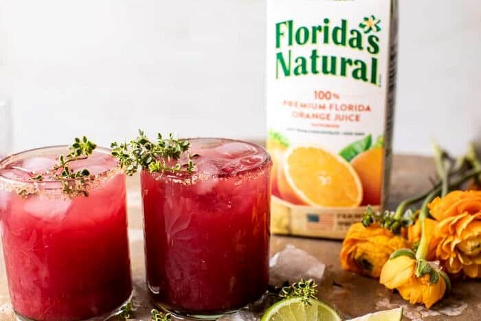 Orange Hibiscus Mai Tai | halfbakedharvest.com side angled horizontal photo of Orange Hibiscus Mai Tai