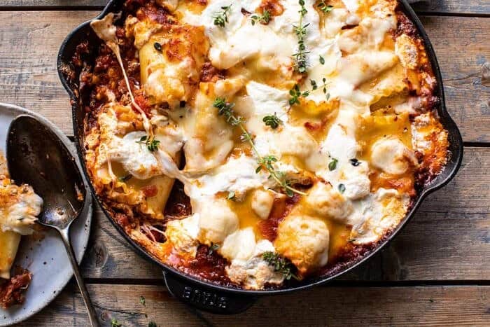 overhead horizontal photo of Simple Skillet Pesto Cheese Lasagna Roll Ups 