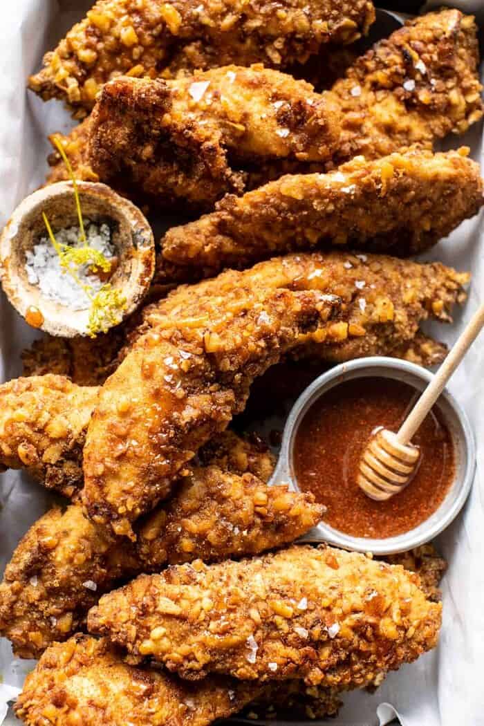 overhead close up photo of Spicy Honey Mustard Pretzel Chicken Fingers