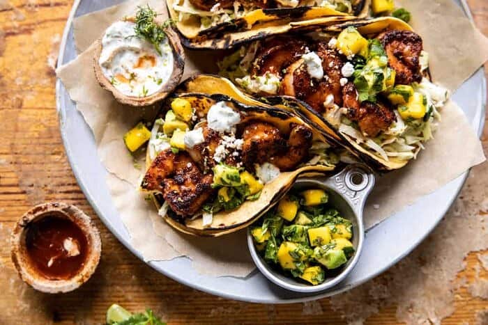 overhead horizontal photo of Chipotle BBQ Shrimp Tacos with Creamy Ranch Slaw 