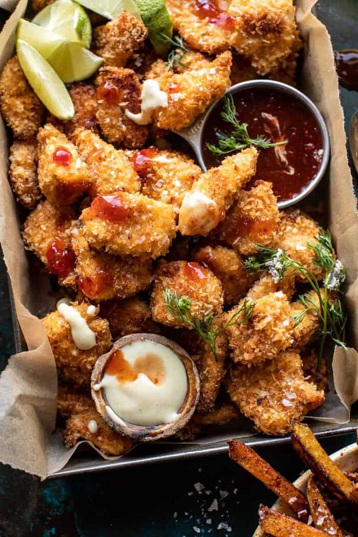 overhead close up photo of Coconut Popcorn Chicken with Sweet Thai Chili Lime Sauce