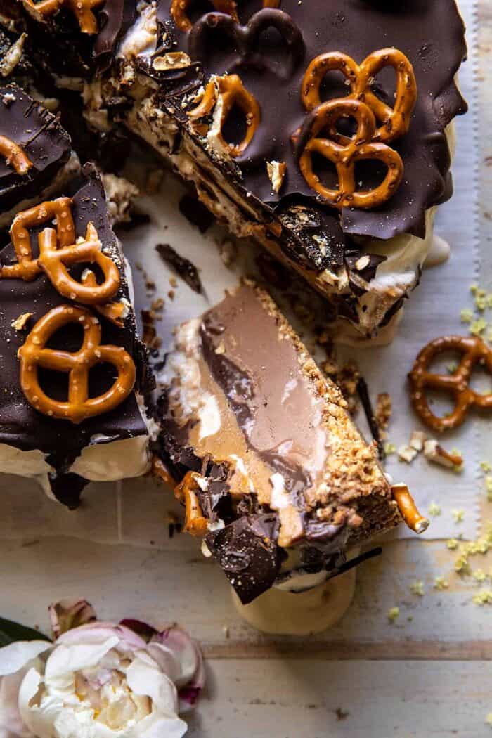 Fudgy Chocolate Peanut Butter Ice Cream Pretzel Cake | halfbakedharvest.com overhead close up photo of Fudgy Chocolate Peanut Butter Ice Cream Pretzel Cake slice
