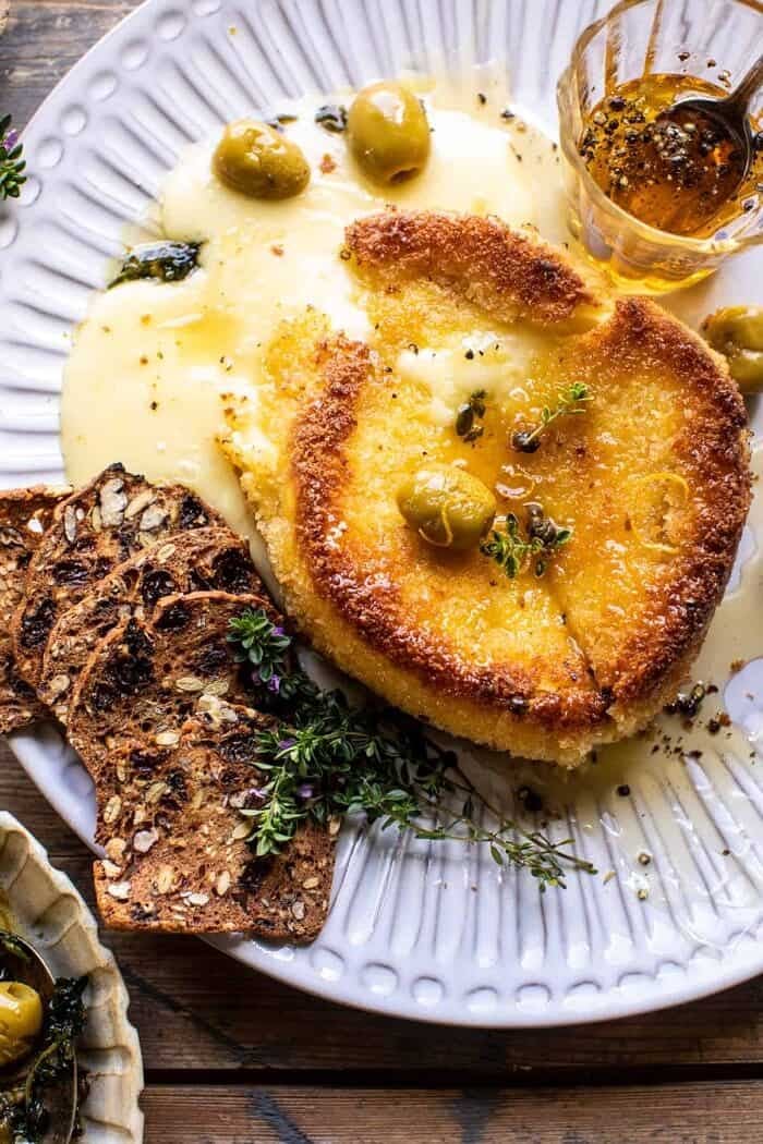 Pan Fried Brie with Peppered Honey and Olives | halfbakedharvest.com