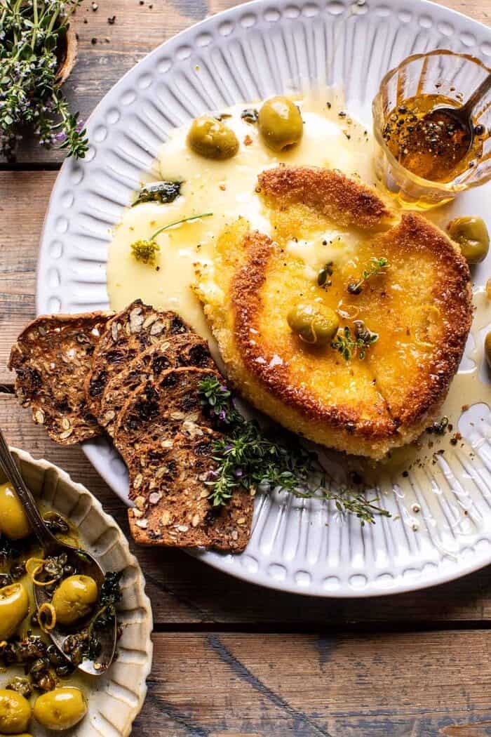 Pan Fried Brie with Peppered Honey and Olives | halfbakedharvest.com overhead photo of Pan Fried Brie with Peppered Honey and Olives