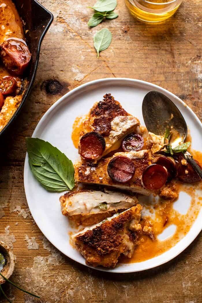 Skillet Cheesy Pepperoni Pizza Chicken | halfbakedharvest.com overhead close up photo of Skillet Cheesy Pepperoni Pizza Chicken plated and sliced