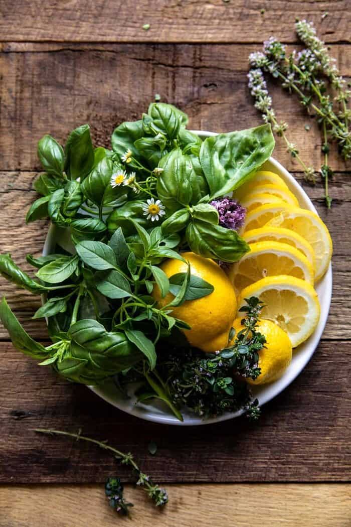 overhead prep photo of herbs and lemons 