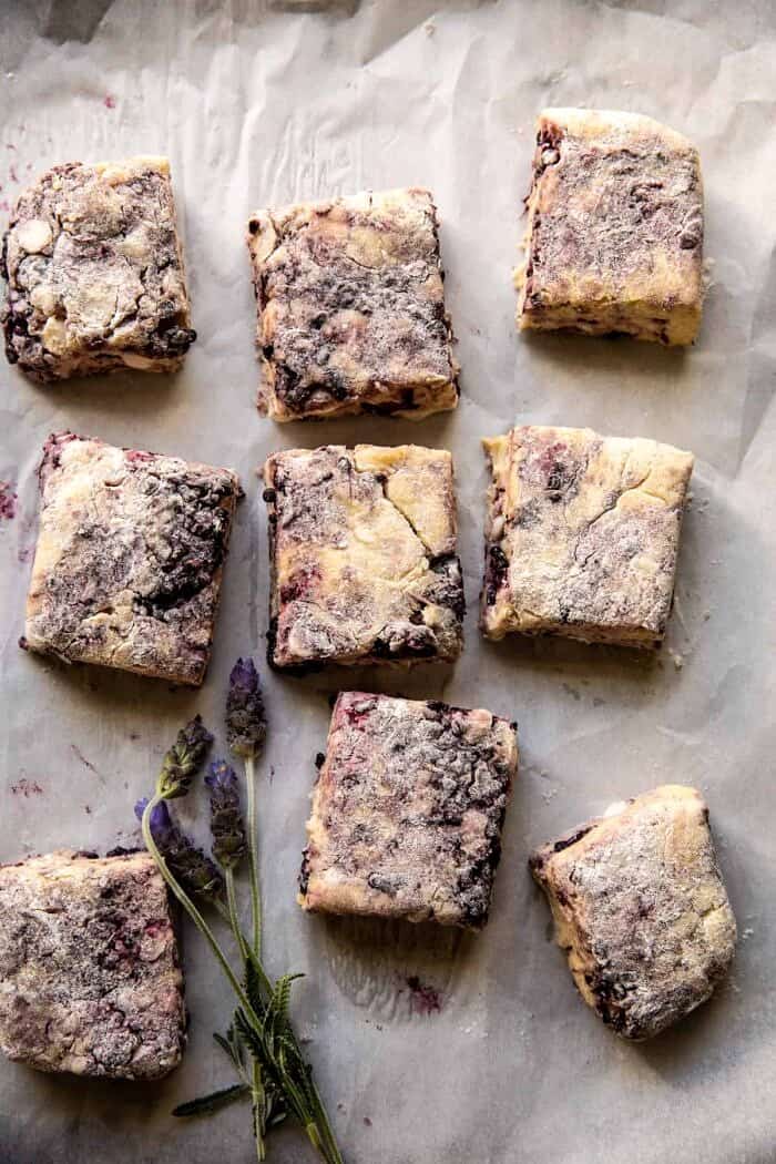 Blackberry Lavender White Chocolate Scones | halfbakedharvest.com overhead photo of Blackberry Lavender White Chocolate Scones on baking sheet before baking