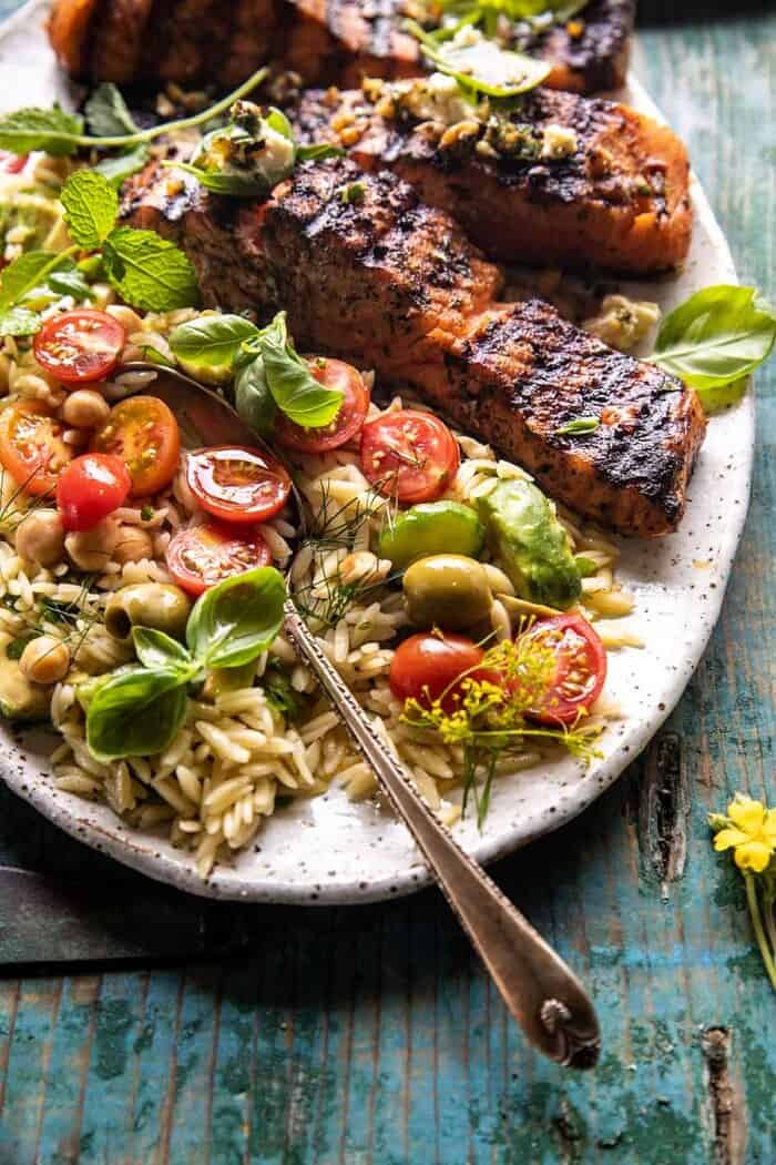 side angle photo of Greek Salmon with Lemon Feta and Orzo Summer Salad