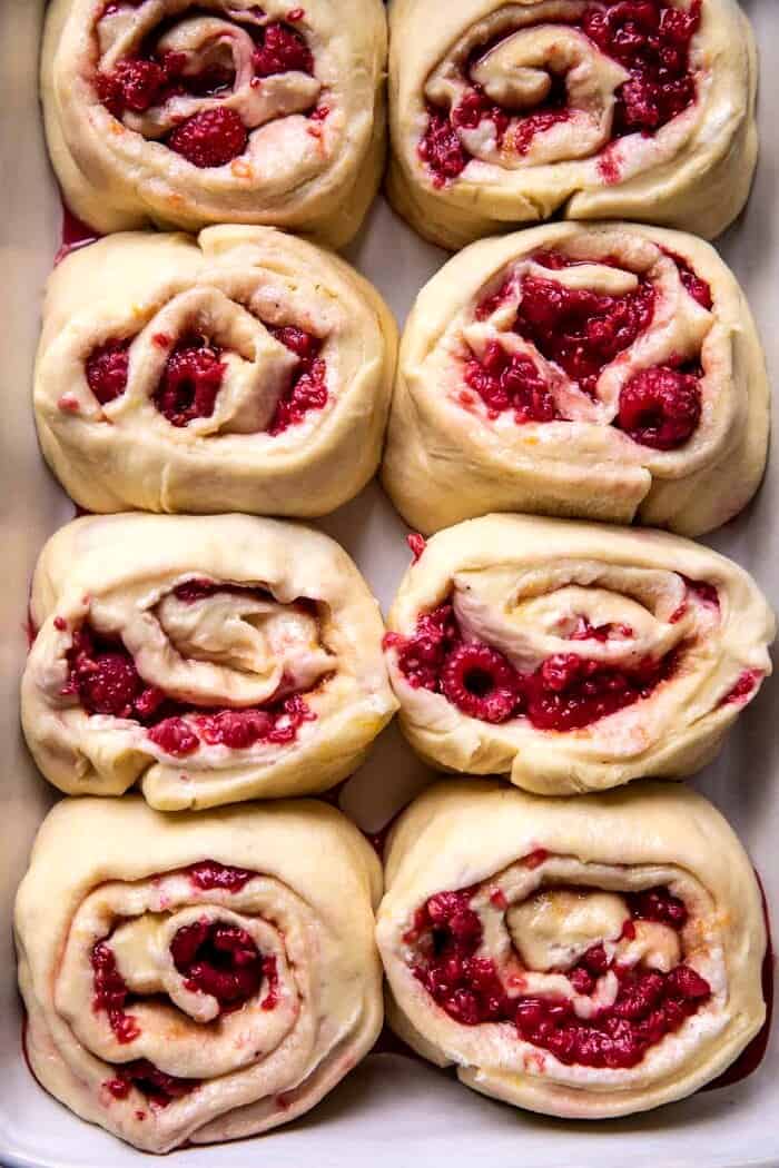overhead photo of Raspberry Lemon Brioche Rolls in baking pan before baking