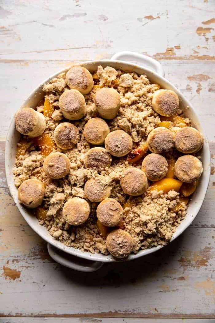Southern Double Crusted Cinnamon Sugar Peach Cobbler | halfbakedharvest.com overhead photo of Southern Double Crusted Cinnamon Sugar Peach Cobbler befoew baking