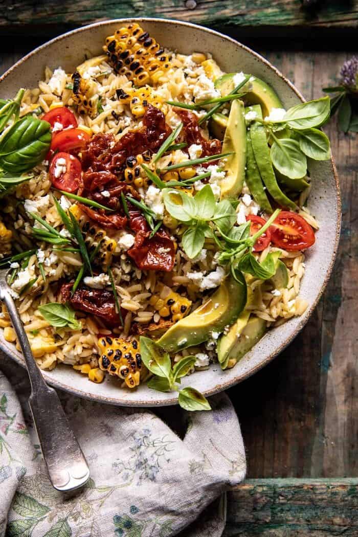 overhead close up photo of Brown Butter Corn and Feta Orzo with Crispy Prosciutto 