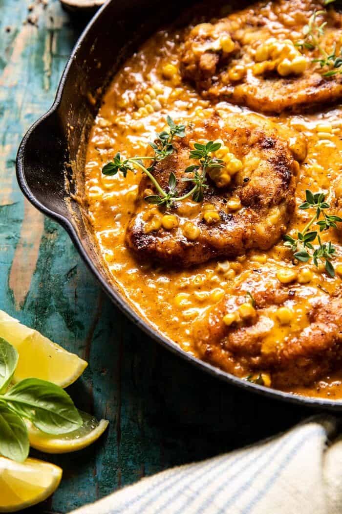 side photo of Creamy Cajun Skillet Chicken Lazone with Herby Corn 