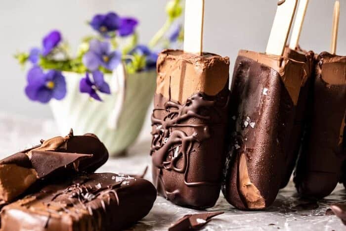 side angled horizontal photo of Creamy Vegan Chocolate Fudge Pops