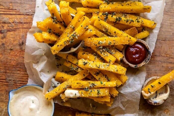 overhead horizontal photo of Garlic Parmesan Herb Butter Polenta Fries with Lemon Aioli 