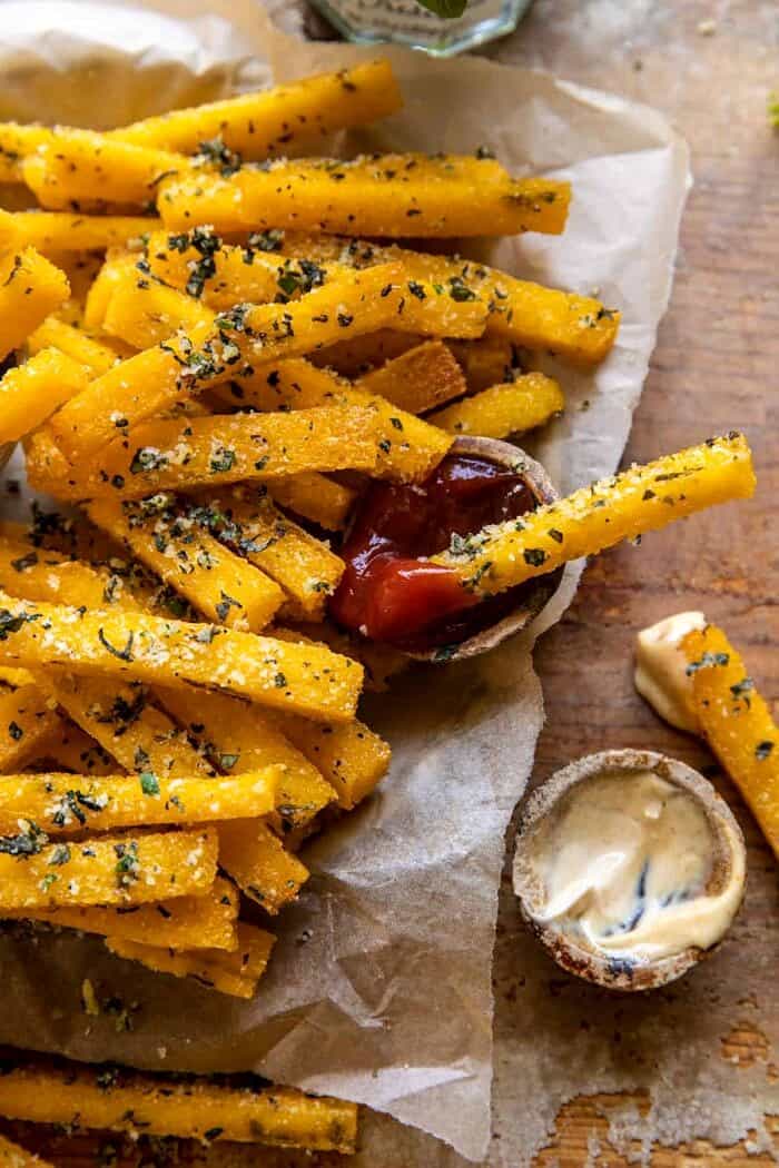 close up photo of Garlic Parmesan Herb Butter Polenta Fries with Lemon Aioli\