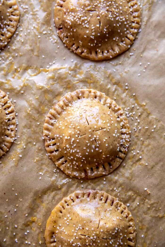 Jammy Raspberry Cream Pretzel Hand Pies before baking on baking sheet 