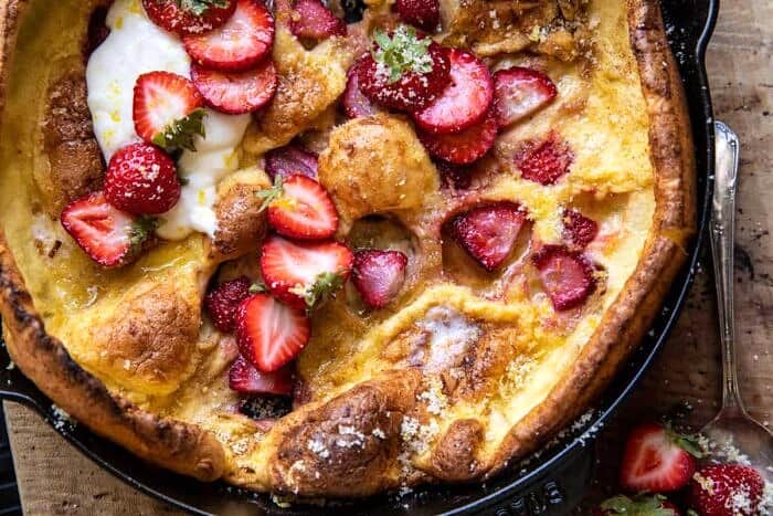 Lemon Strawberry Dutch Baby with Ricotta Cream | halfbakedharvest.com overhead horizontal photo of Lemon Strawberry Dutch Baby with Ricotta Cream