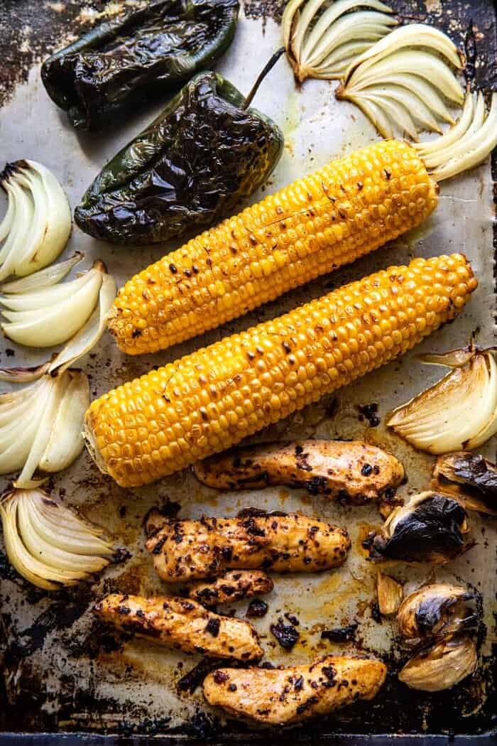 overhead photo of Sheet Pan tray full of chicken and vegetables 