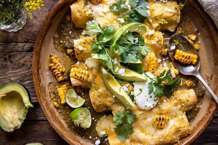 overhead horizontal photo of Sheet Pan Chipotle Cheddar Corn Chicken Enchiladas