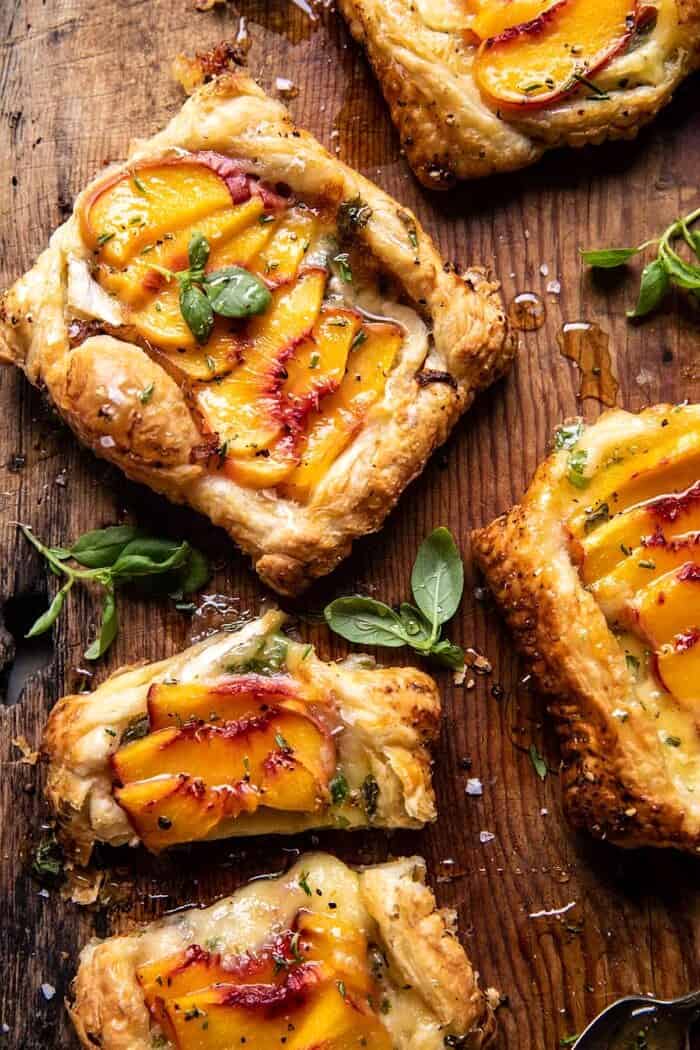 overhead photo of Peach Brie Pastry Tarts with Peppered Rosemary Honey