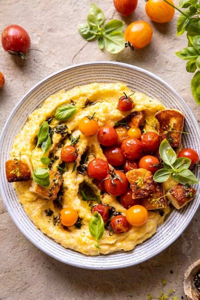 overhead close up photo of Cherry Tomato Pesto Polenta with Fried Halloumi