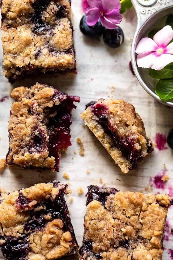 Cinnamon Sugar Blueberry Crumb Bars | halfbakedbarvest.com overhead photo of Cinnamon Sugar Blueberry Crumb Bar