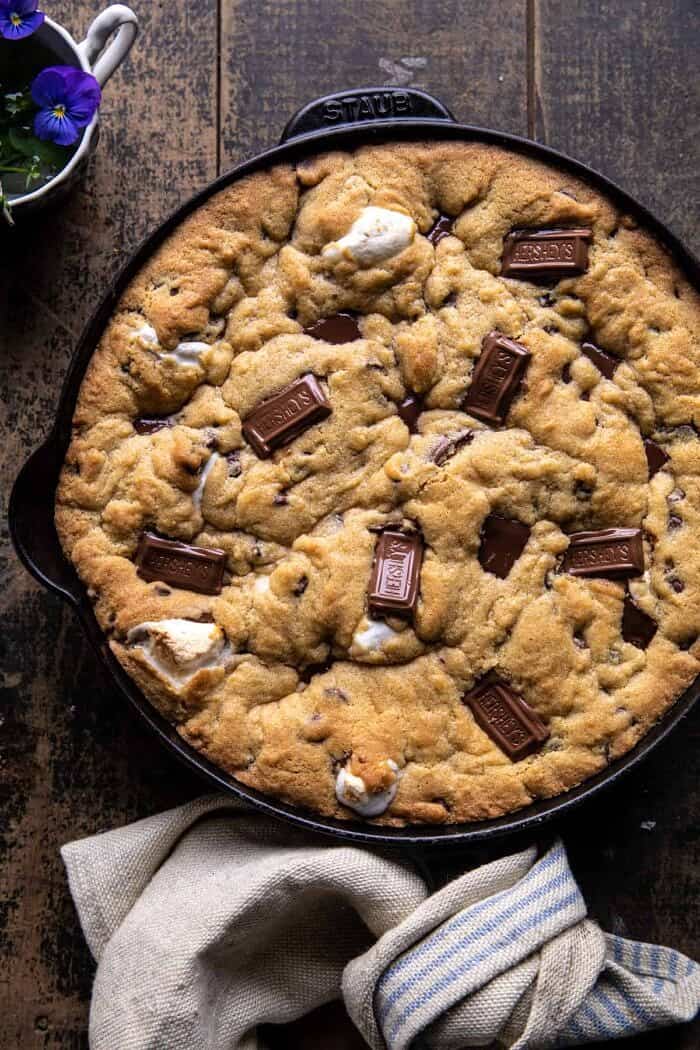 Giant S’mores Stuffed Chocolate Chip Skillet Cookie | halfbakedharvest.com overhead photo of Giant S’mores Stuffed Chocolate Chip Skillet Cookie without ice cream