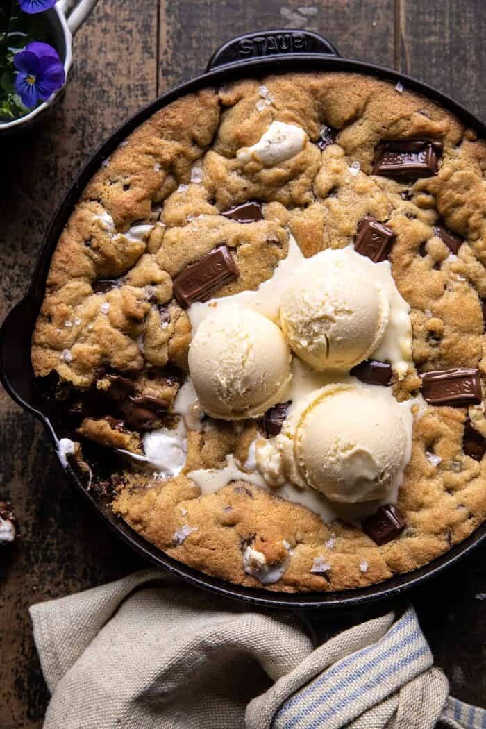 Giant S’mores Stuffed Chocolate Chip Skillet Cookie | halfbakedharvest.com overhead close up phot of Giant S’mores Stuffed Chocolate Chip Skillet Cookie