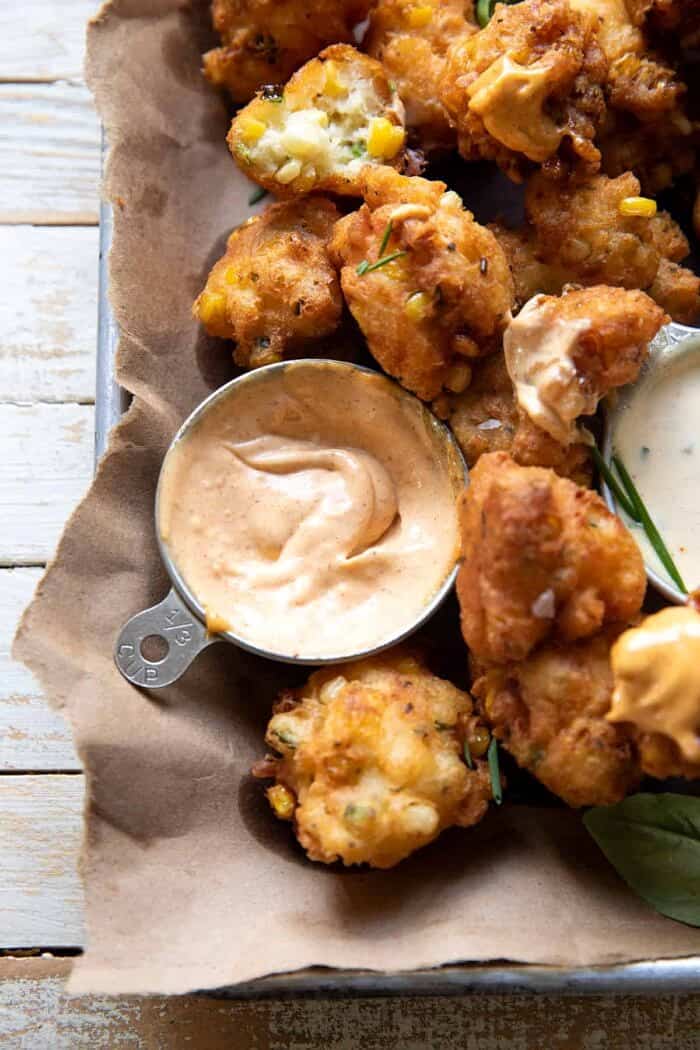 Jalapeño Cheddar Corn Fritters with Chipotle Aioli | halfbakedharvest.com overhead close up photo of Chipotle Aioli