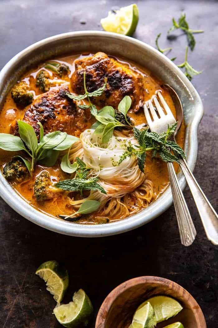 side angled photo of Saucy Coconut Braised Chicken with Rice Noodles and Broccoli 