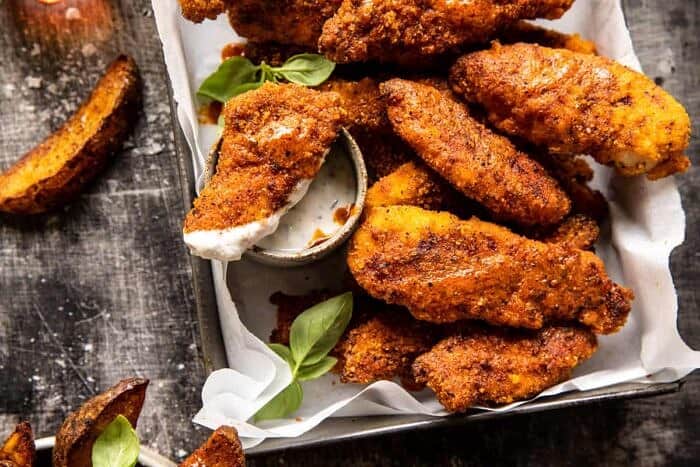 Black Pepper Rub Chicken Fingers with Greek Yogurt Ranch | halfbakedharvest.com overhead close up photo of Black Pepper Rub Chicken Fingers with Greek Yogurt Ranch
