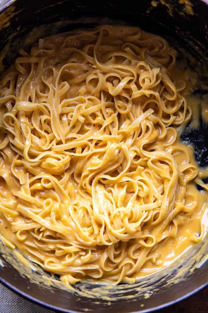 Butternut Squash Pasta Carbonara with Rosemary Bacon | halfbakedharvest.com Butternut Squash Pasta Carbonara in pot after tossing