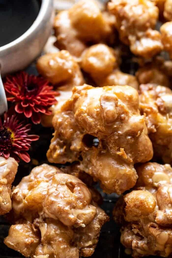 overhead close up photo of Cinnamon Spiced Apple Fritters with Vanilla Coffee Glaze