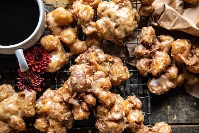 overhead horizontal photo of Cinnamon Spiced Apple Fritters with Vanilla Coffee Glaze