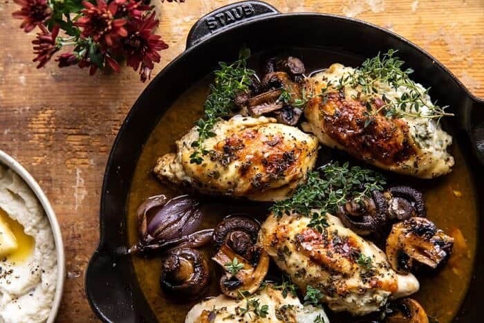 overhead horizontal photo of Herbed Ricotta Stuffed Chicken In White Wine Pan Sauce