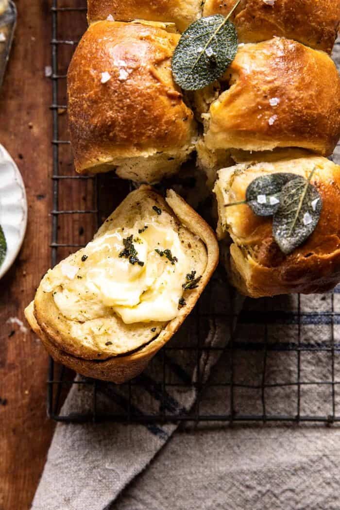 Pull Apart Parmesan Sage Butter Brioche Rolls | halfbakedharvest.com overhead close up photo of Pull Apart Parmesan Sage Butter Brioche Rolls